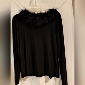 Black sweater with feathers